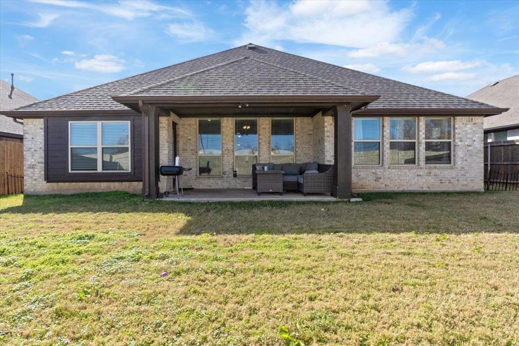 4209 Misty Ridge Street Mesquite, TX 75181 - Photo 37 of 40 a front view of a house with a yard