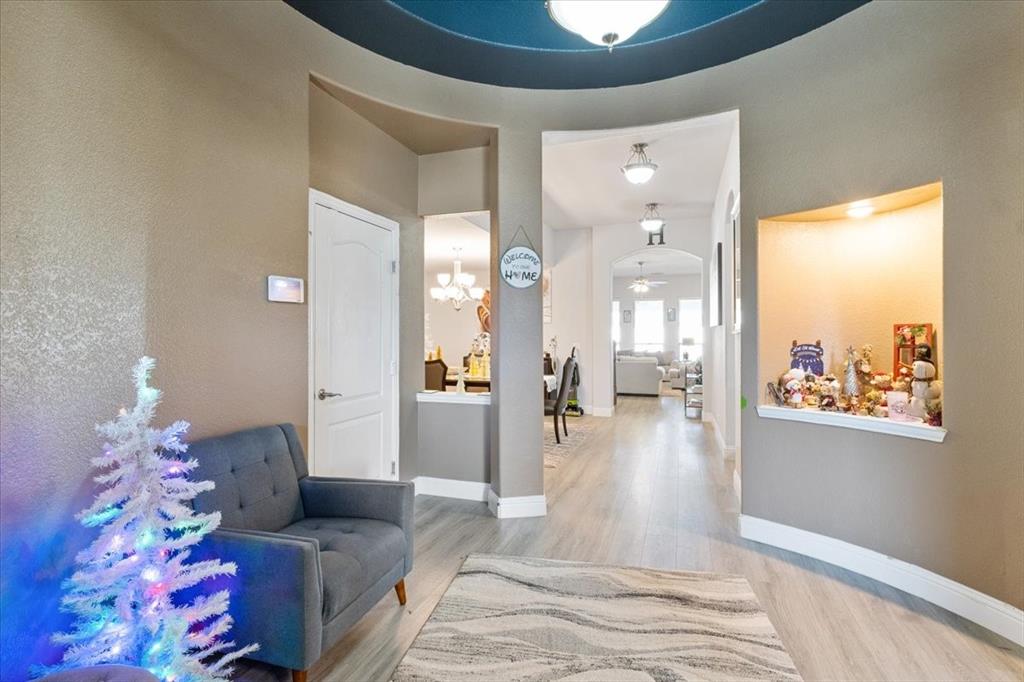 4209 Misty Ridge Street Mesquite, TX 75181 - Photo 8 of 40 a living room with furniture and a large window