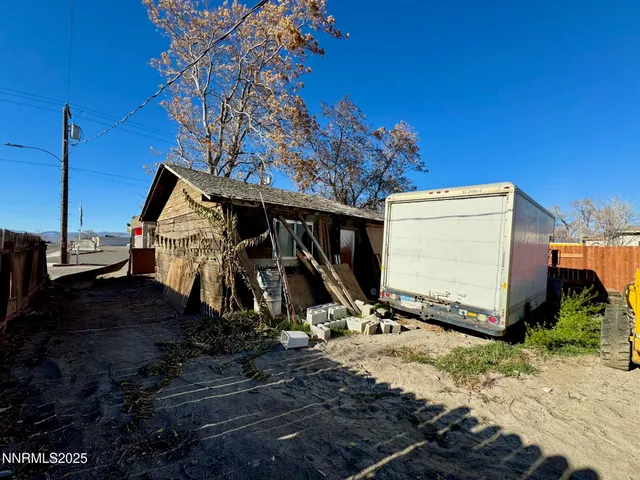 a view of a street in front of a building