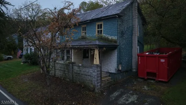 a front view of a house with yard