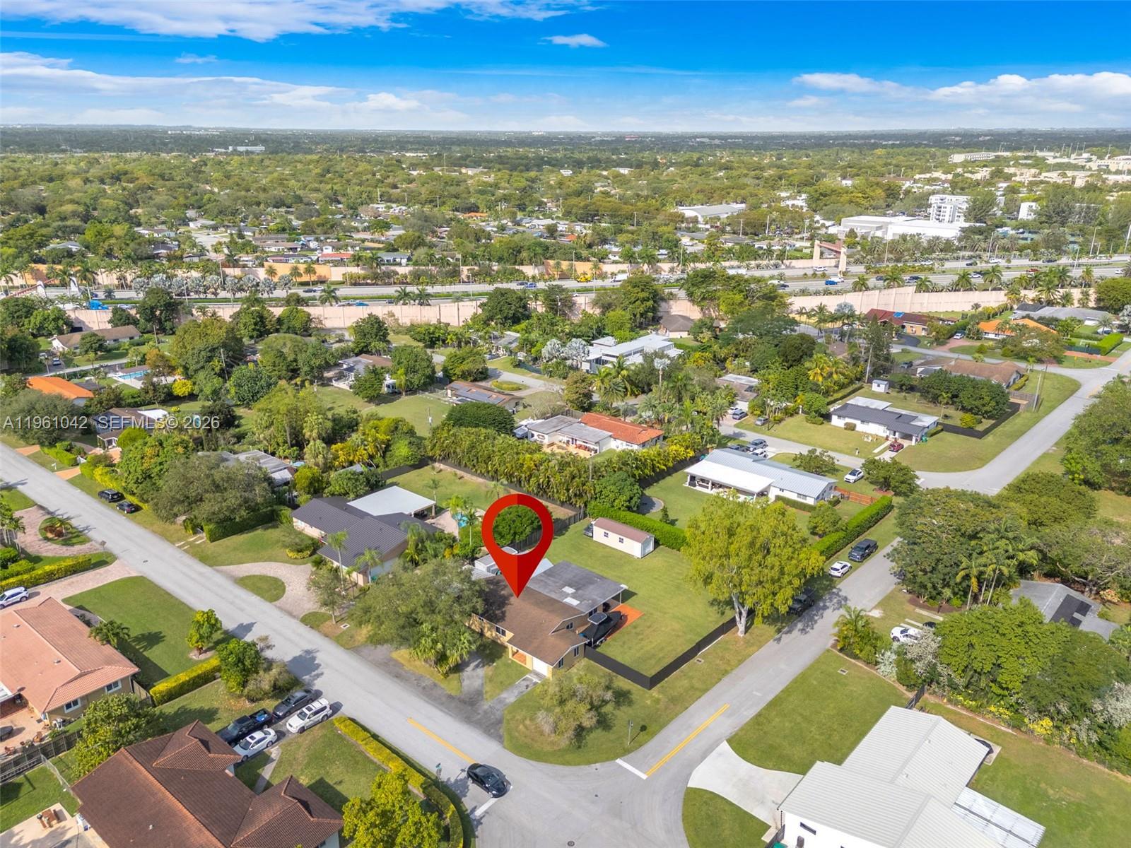 10901 Southwest 116th Street Miami, FL 33176 - Photo 23 of 26 an aerial view of residential houses with outdoor space