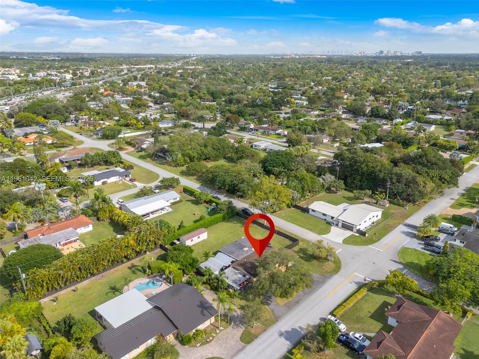 10901 Southwest 116th Street Miami, FL 33176 - Photo 24 of 26 an aerial view of residential houses with outdoor space