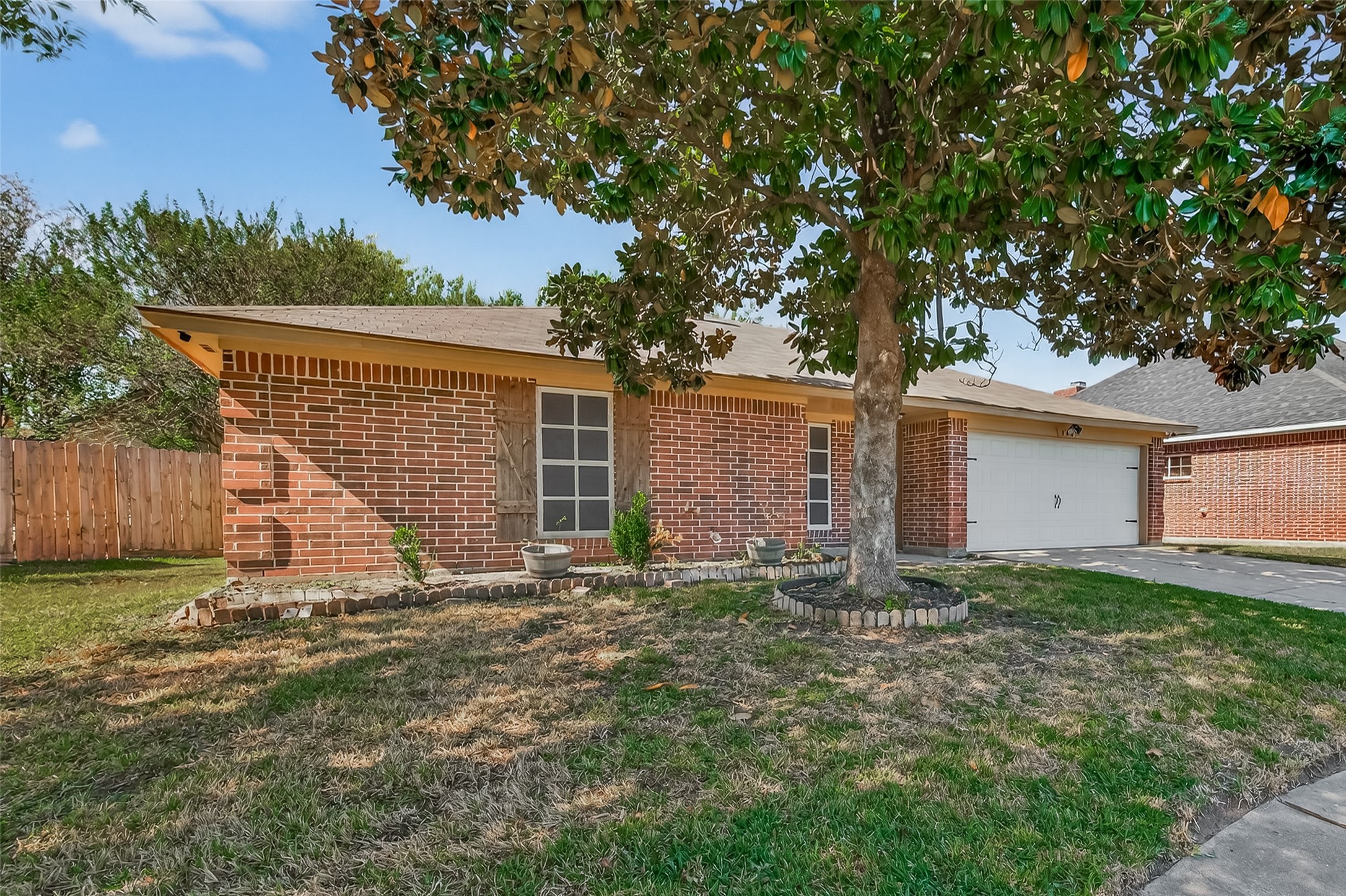 1407 Somercotes Lane Channelview, TX 77530 - Photo 3 of 28 a view of a house with a yard and tree