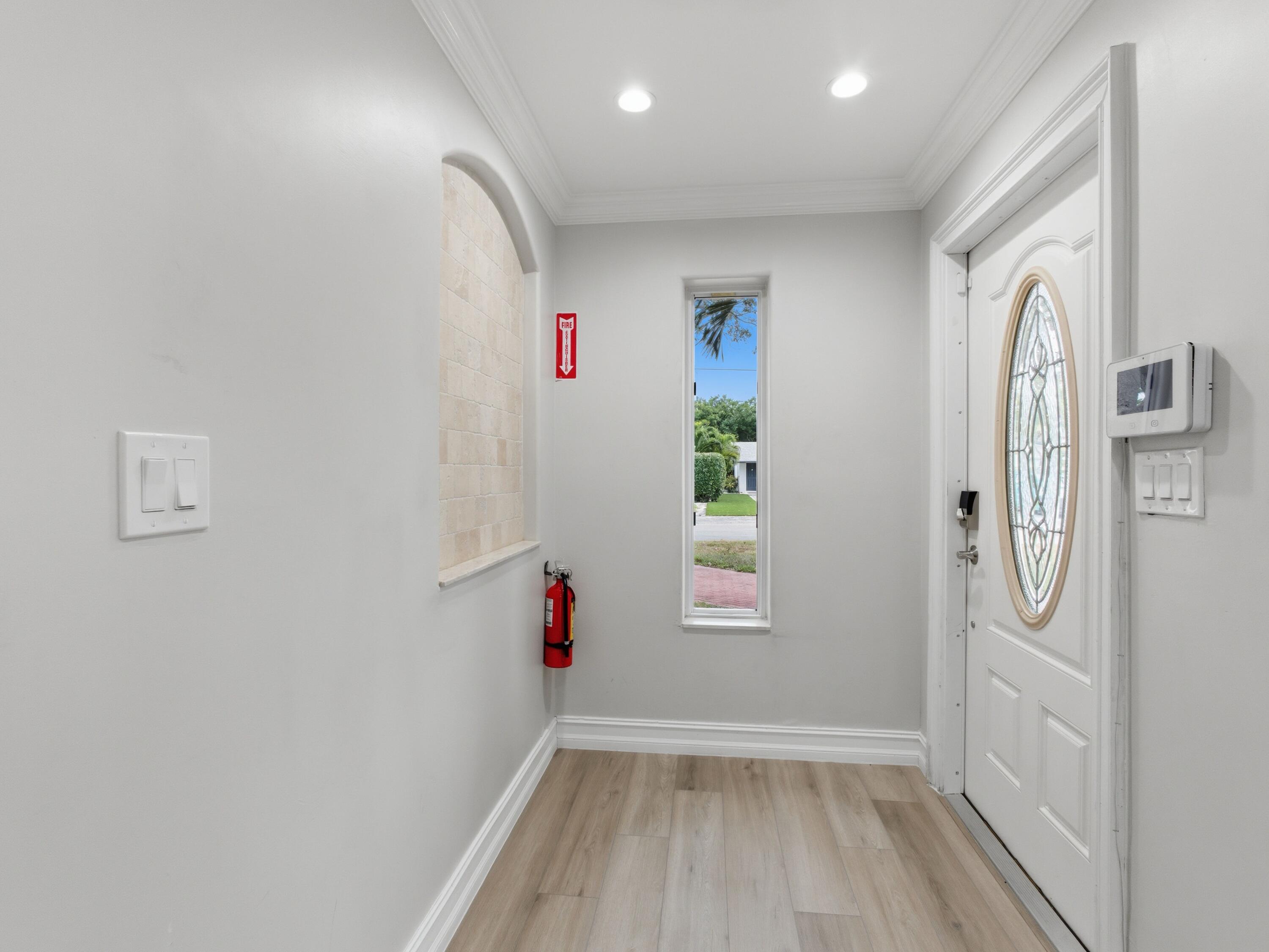 1921 Northeast 28th Court Lighthouse Point, FL 33064 - Photo 5 of 40 Foyer