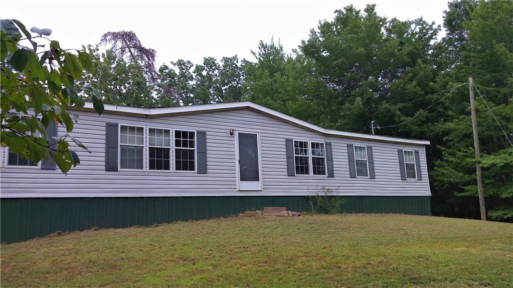 796 East Damascus Church Road Ranger, GA 30734 - Photo 1 of 1 a view of a house with a swimming pool