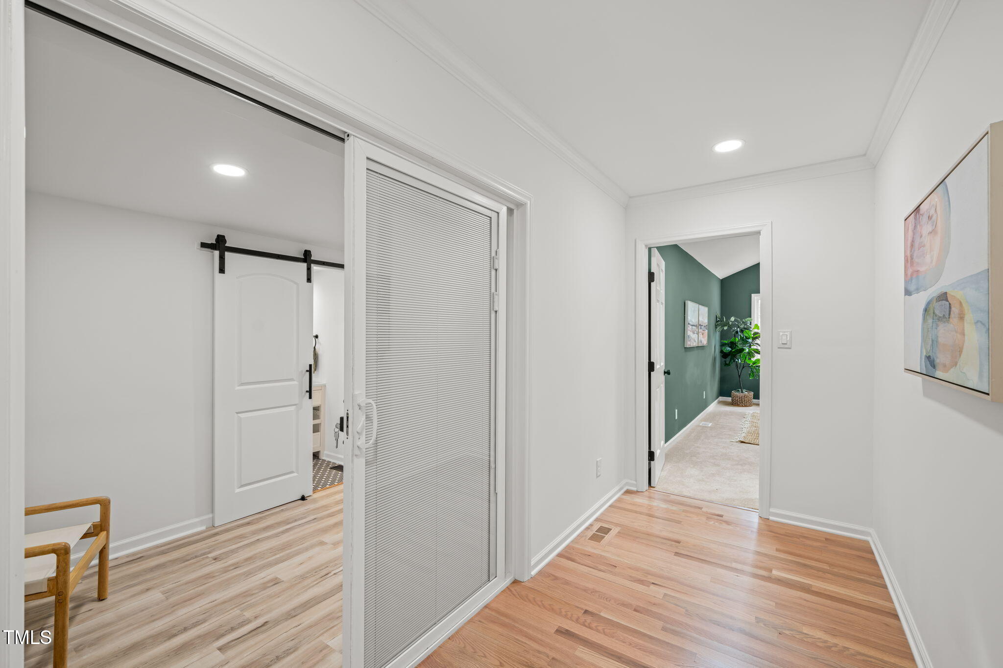 316 Ebon Road Durham, NC 27713 - Photo 13 of 48 a view of hallway with wooden floor