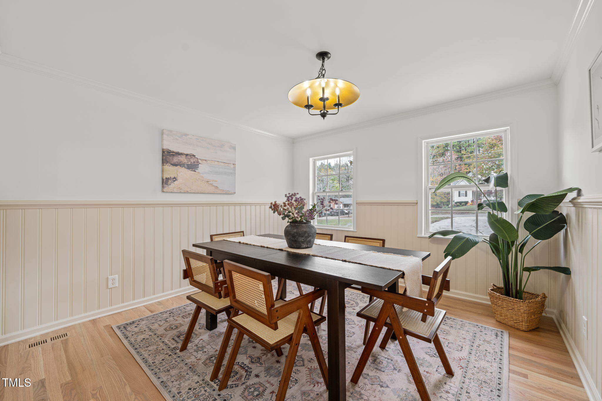 316 Ebon Road Durham, NC 27713 - Photo 2 of 48 a view of a dining room with furniture and wooden floor