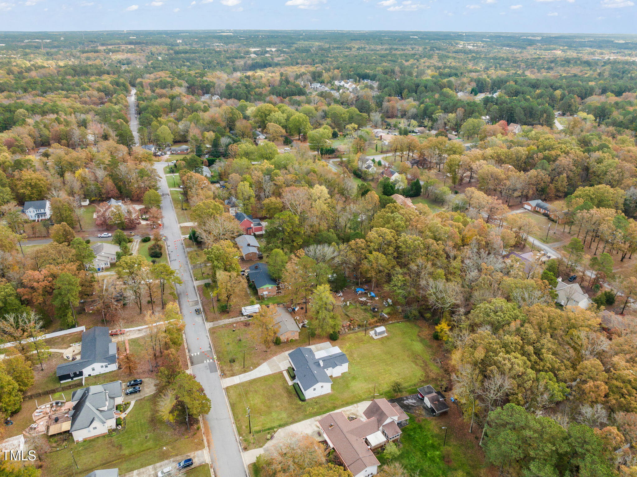 316 Ebon Road Durham, NC 27713 - Photo 35 of 48 a view of a city with lush green forest