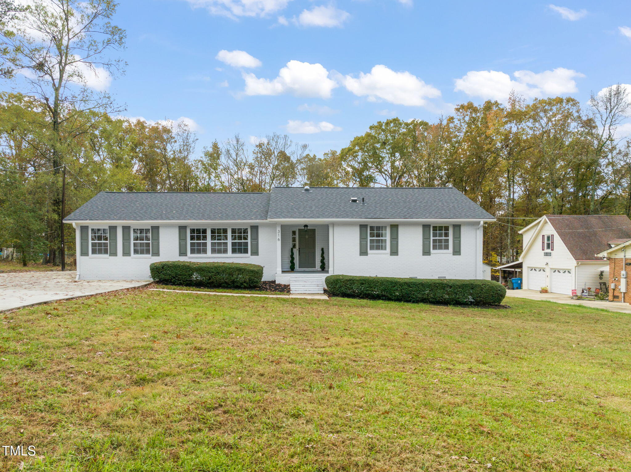 316 Ebon Road Durham, NC 27713 - Photo 6 of 48 a view of a house with a yard