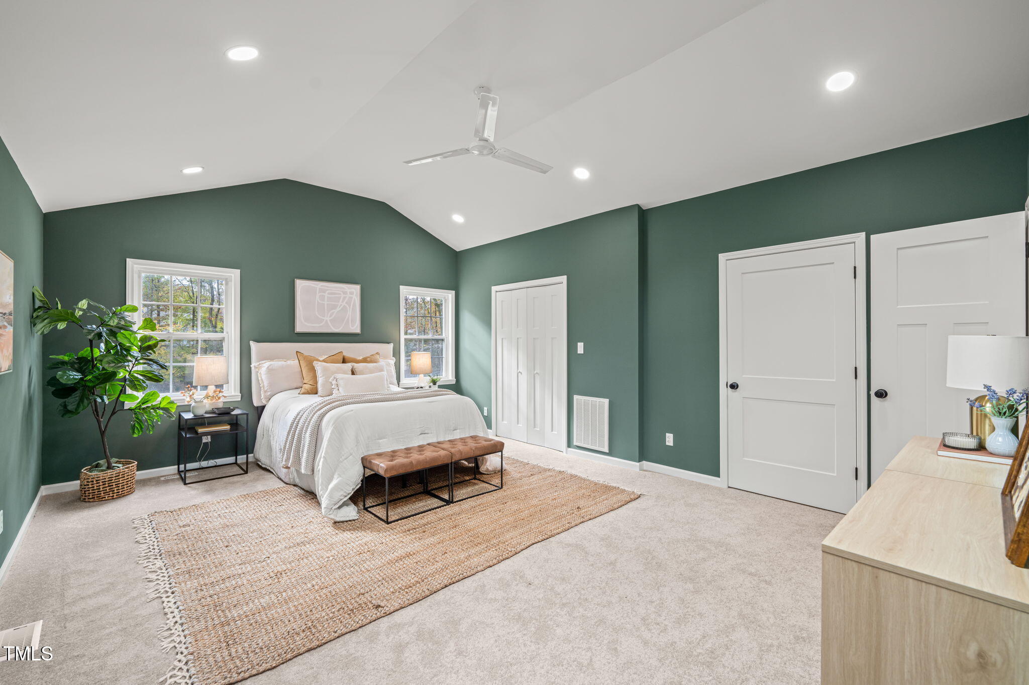 316 Ebon Road Durham, NC 27713 - Photo 9 of 48 a spacious bedroom with a large bed and a dresser