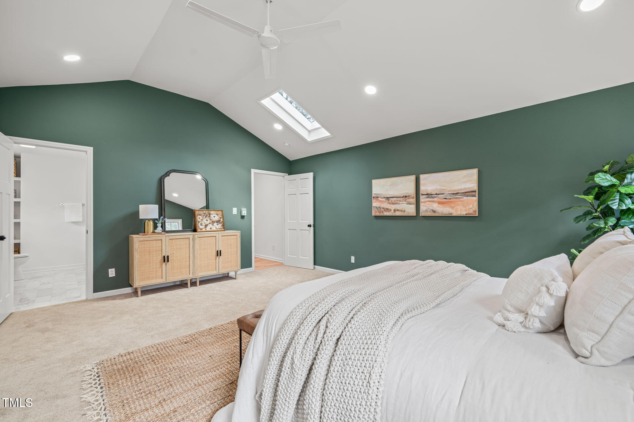 316 Ebon Road Durham, NC 27713 - Photo 10 of 48 a bedroom with a large bed and a tv