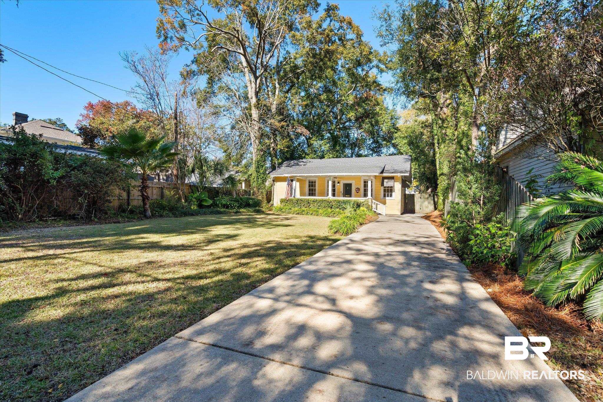 1220 Elmira Street Mobile, AL 36604 - Photo 20 of 20 View of front of property with a porch and a front lawn
