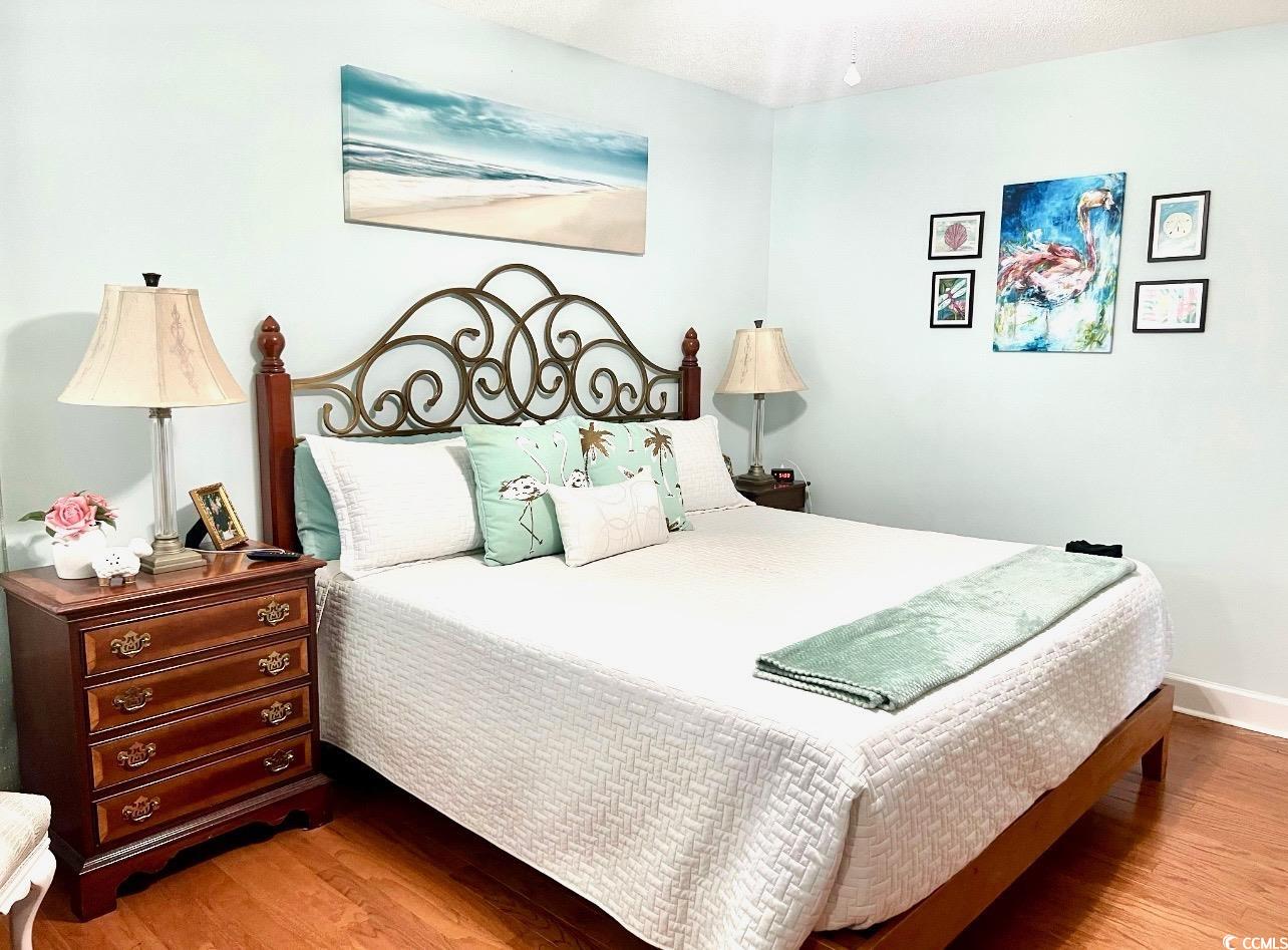3607 Brampton Drive Myrtle Beach, SC 29588 - Photo 14 of 34 Bedroom with light wood-style floors and baseboards