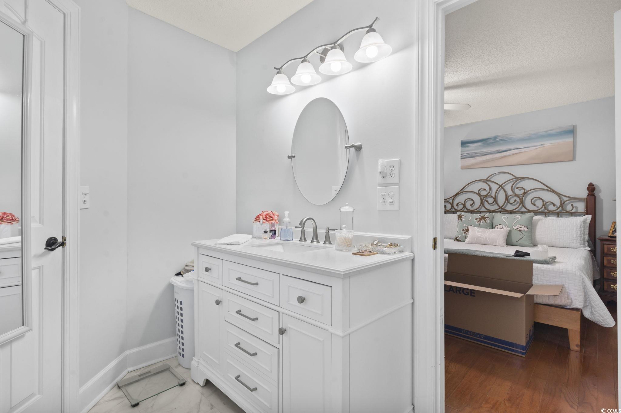 3607 Brampton Drive Myrtle Beach, SC 29588 - Photo 16 of 34 Ensuite bathroom with vanity