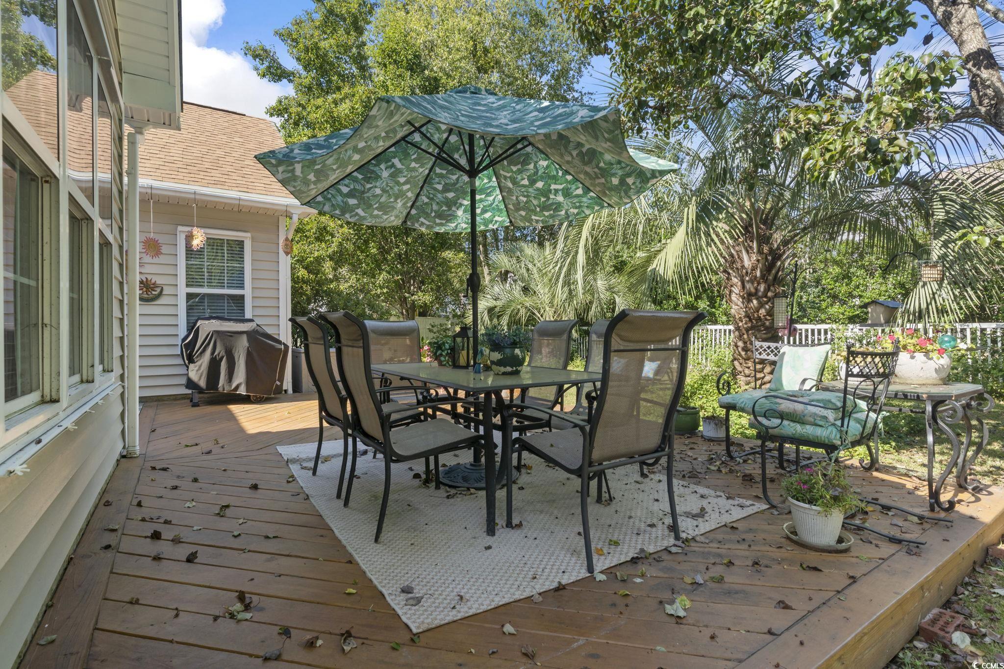 3607 Brampton Drive Myrtle Beach, SC 29588 - Photo 24 of 34 Deck featuring outdoor dining area and grilling area