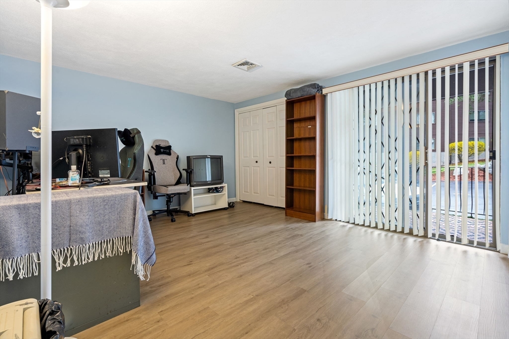 135 Forest Street, Unit W2 Saugus, MA 01906 - Photo 11 of 23 a view of a living room and entryway