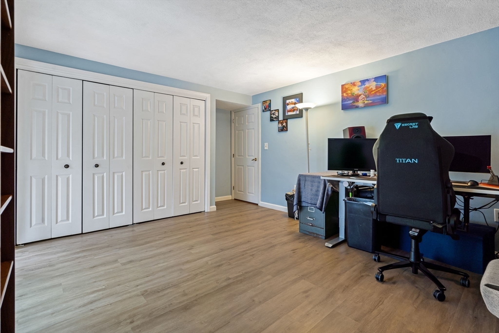 135 Forest Street, Unit W2 Saugus, MA 01906 - Photo 13 of 23 a view of a workspace with furniture and a window