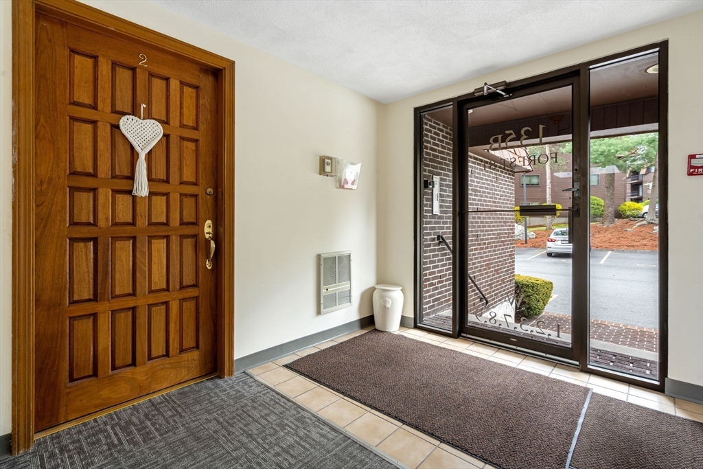 135 Forest Street, Unit W2 Saugus, MA 01906 - Photo 16 of 23 a view of an entryway door