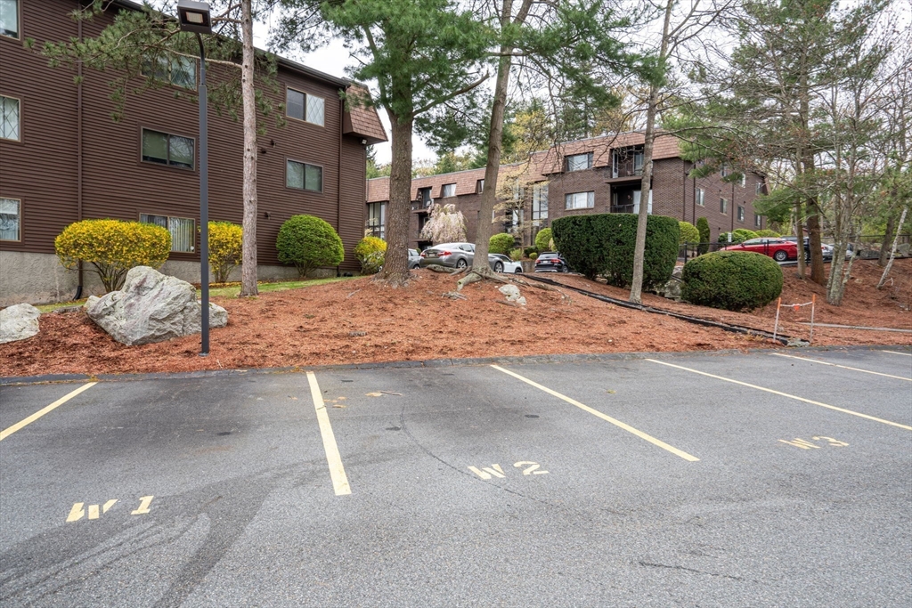 135 Forest Street, Unit W2 Saugus, MA 01906 - Photo 18 of 23 a view of a brick house with a street
