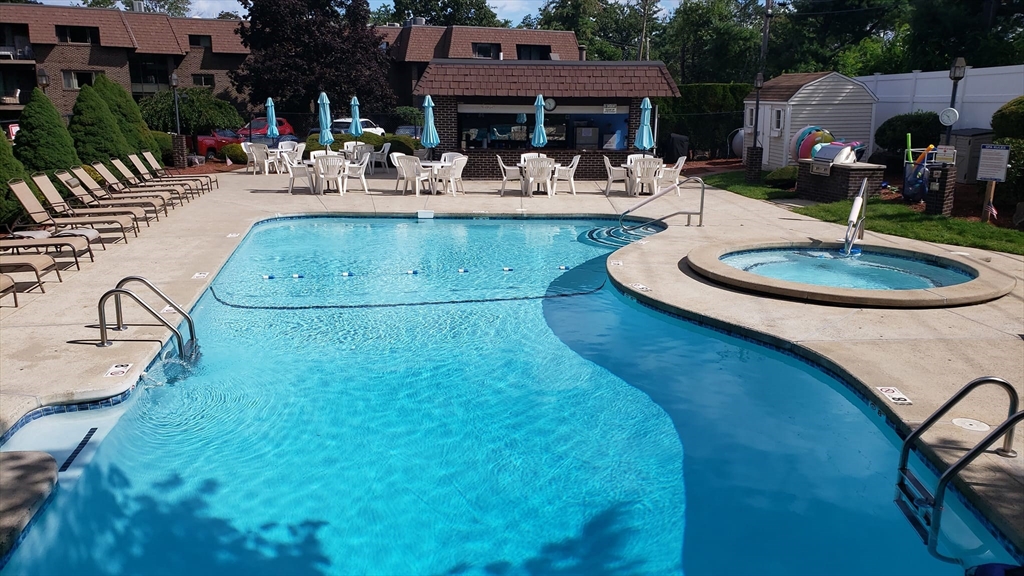 135 Forest Street, Unit W2 Saugus, MA 01906 - Photo 23 of 23 a view of a swimming pool with a patio