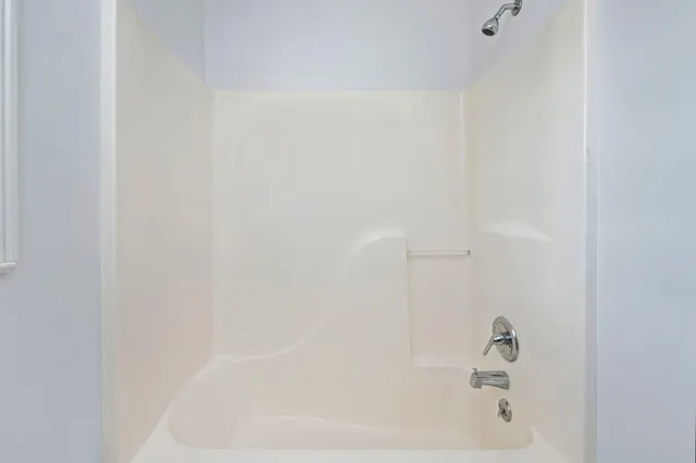 a close up of a bathtub