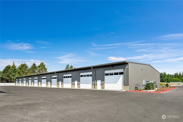 a front view of a house with a garage