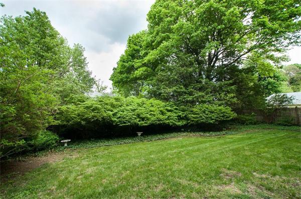 58 Governors Road Milton, MA 02186 - Photo 29 of 30 a view of a yard with a trees