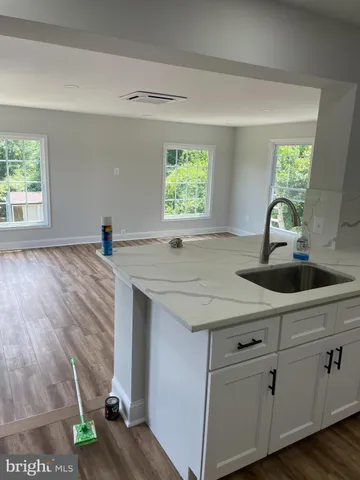a kitchen with sink and window