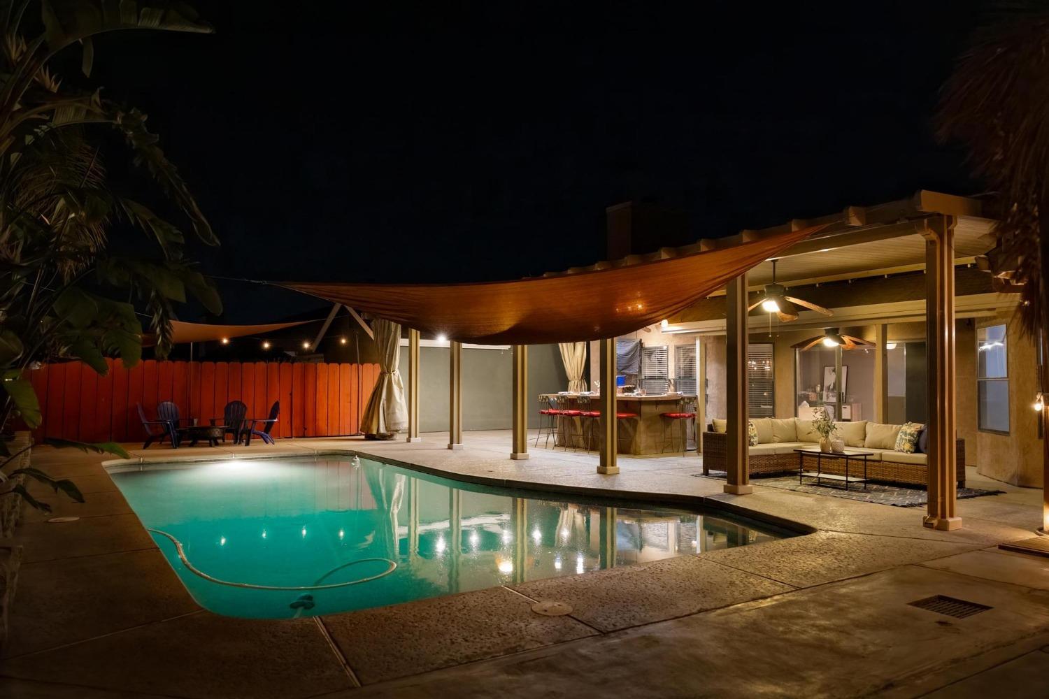 866 Mission Ridge Drive Manteca, CA 95337 - Photo 1 of 1 Twilight view of this entertainer's delight backyard oasis!