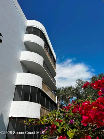 a view of balcony with flowers