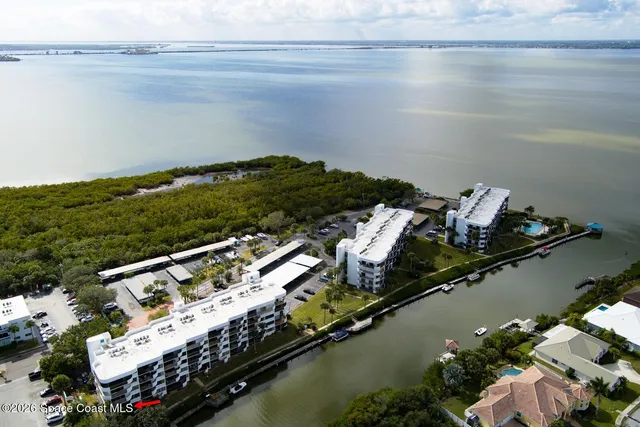 a view of a lake with a house
