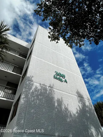 a bathroom with a granite countertop sink and a stove
