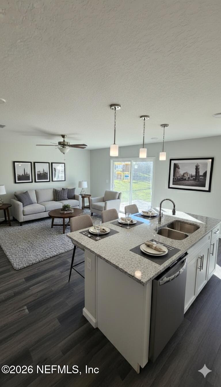 1070 Cahoon Road South Jacksonville, FL 32221 - Photo 8 of 8 a kitchen with stainless steel appliances granite countertop a stove a sink and a refrigerator