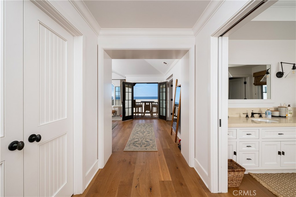 1228 West Oceanfront Newport Beach, CA 92661 - Photo 22 of 32 a view of a bedroom from a hallway