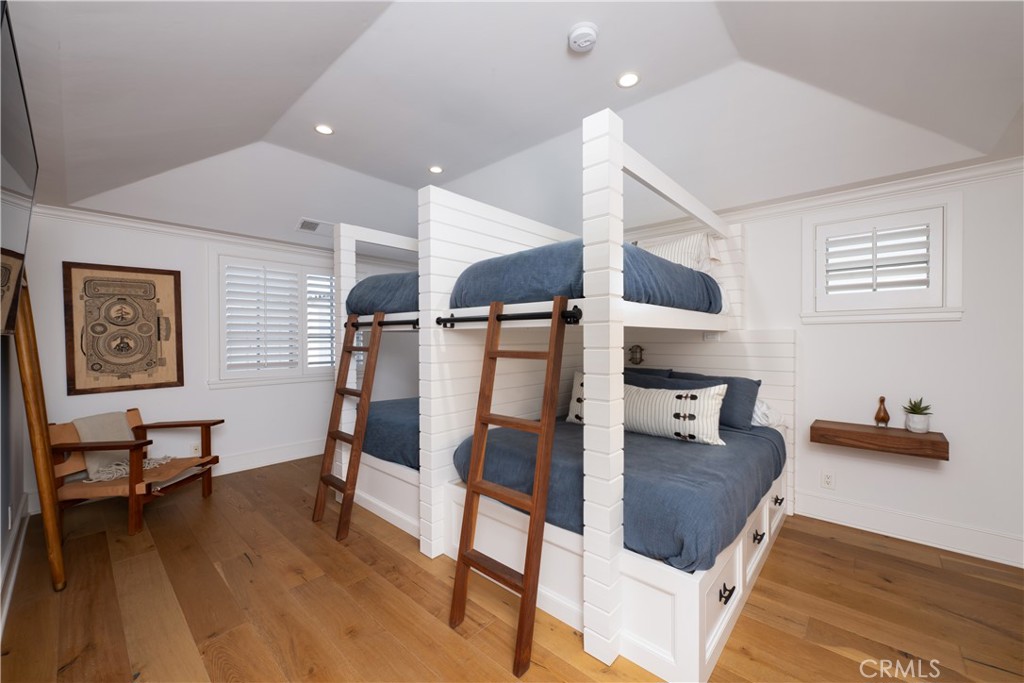 1228 West Oceanfront Newport Beach, CA 92661 - Photo 24 of 32 a living room with furniture and wooden floor