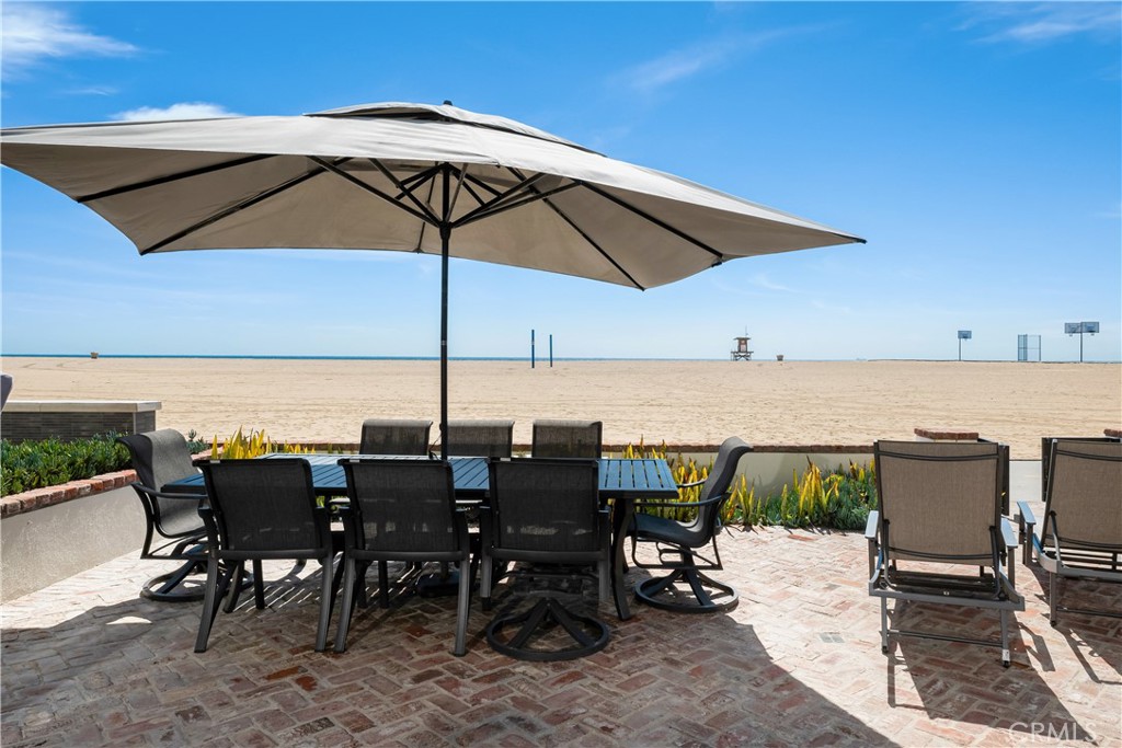 1228 West Oceanfront Newport Beach, CA 92661 - Photo 30 of 32 a view of a terrace with furniture