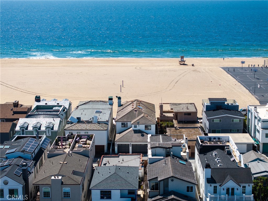 1228 West Oceanfront Newport Beach, CA 92661 - Photo 3 of 32 an aerial view of a building with outdoor space