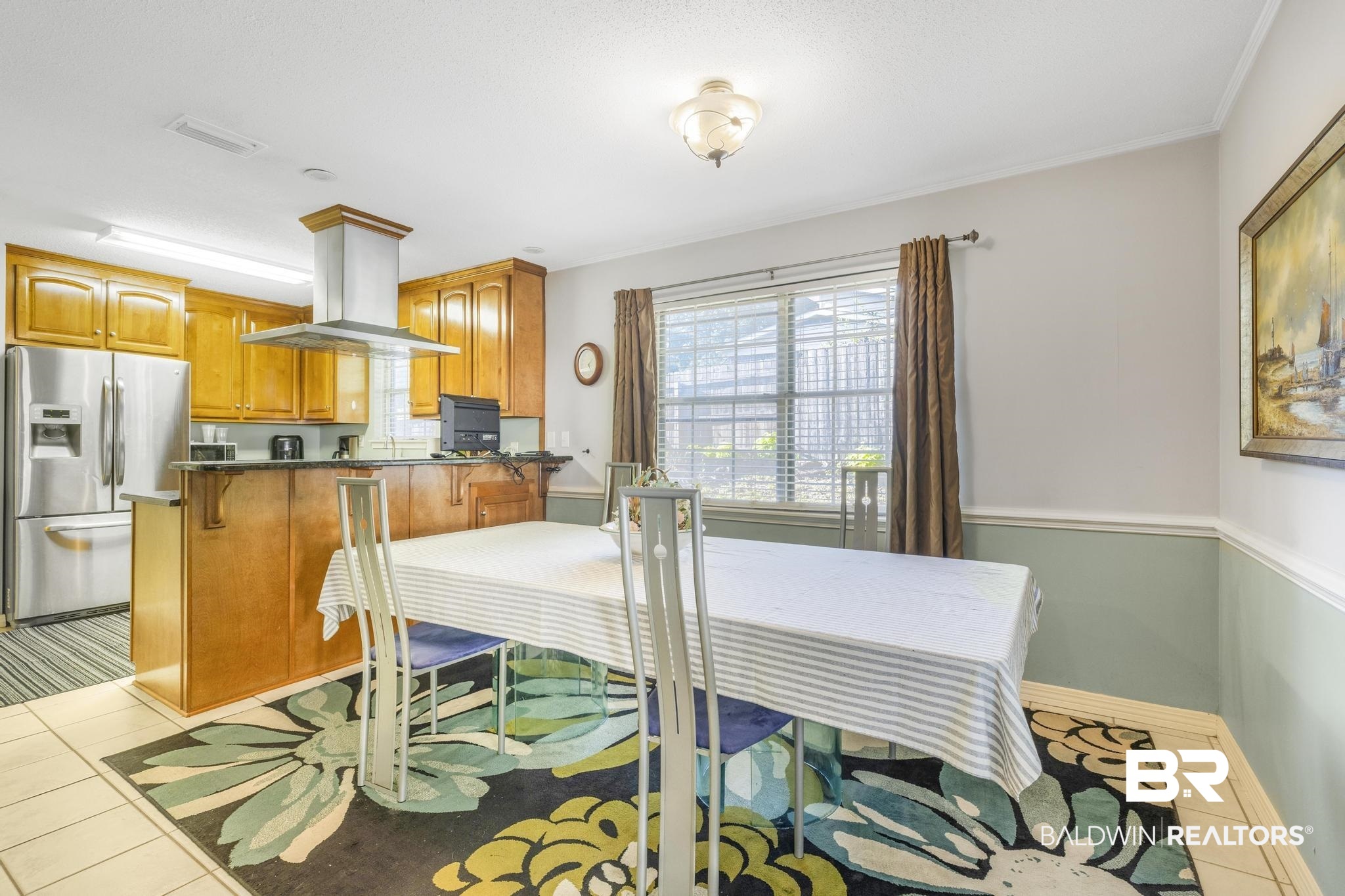 2573 E Road Mobile, AL 36693 - Photo 38 of 45 Dining room featuring light tile patterned flooring and baseboards