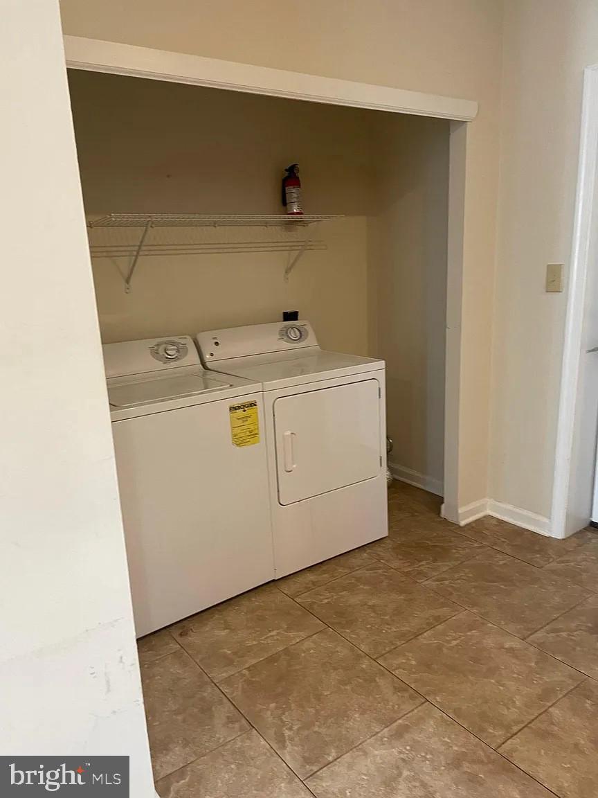 621 North 35th Street Philadelphia, PA 19104 - Photo 2 of 10 a utility room with dryer and washer
