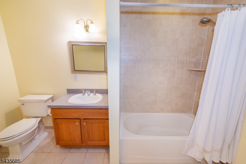 16 Main Street Sparta, NJ 07871 - Photo 22 of 33 a bathroom with a granite countertop sink toilet and shower