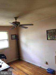 3625 Clarenell Road Baltimore, MD 21229 - Photo 13 of 26 2nd bedroom wood floors ceiling fan