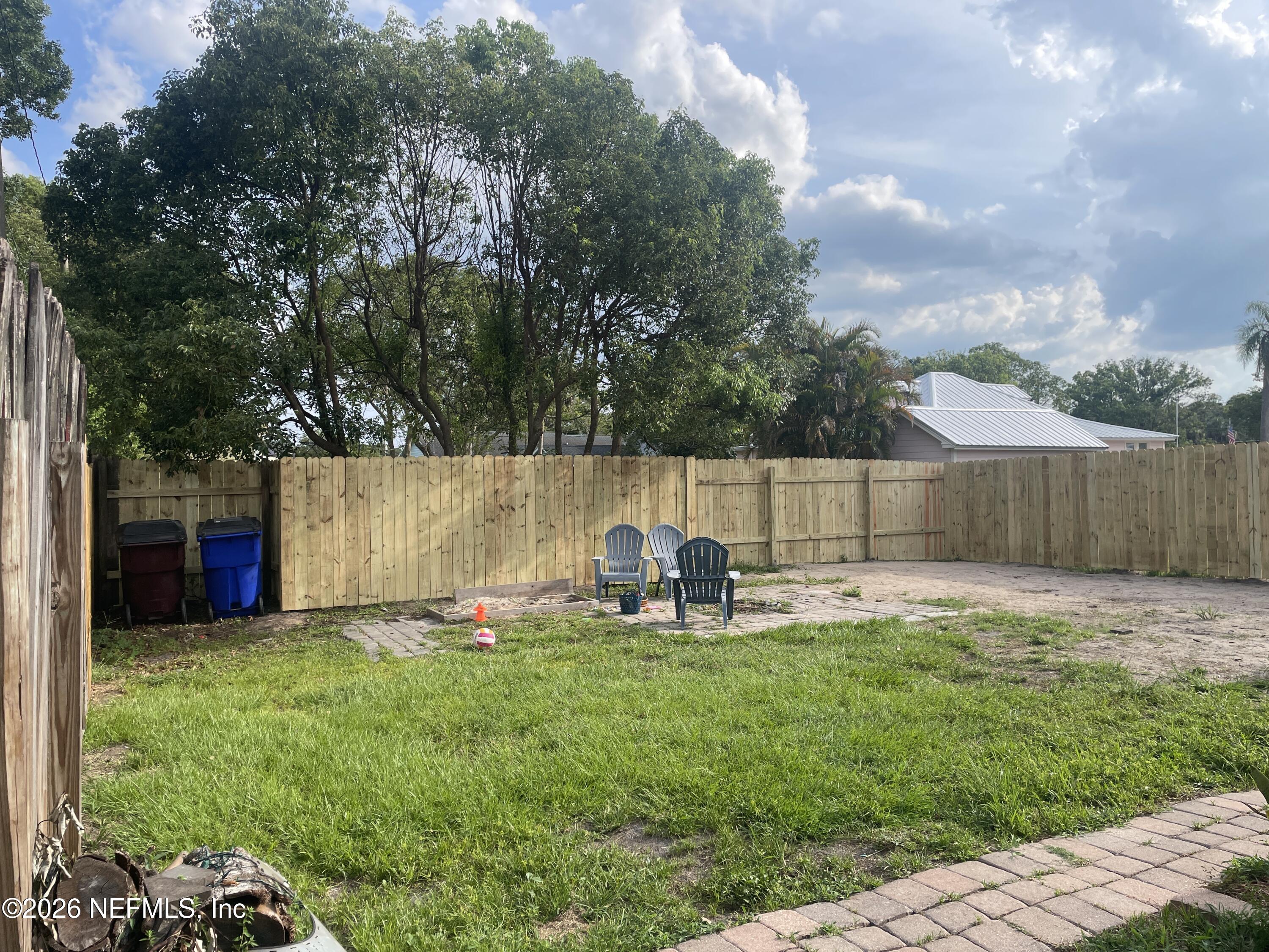 1815 5th Street St. Cloud, FL 34769 - Photo 9 of 9 a backyard of a house with table and chairs