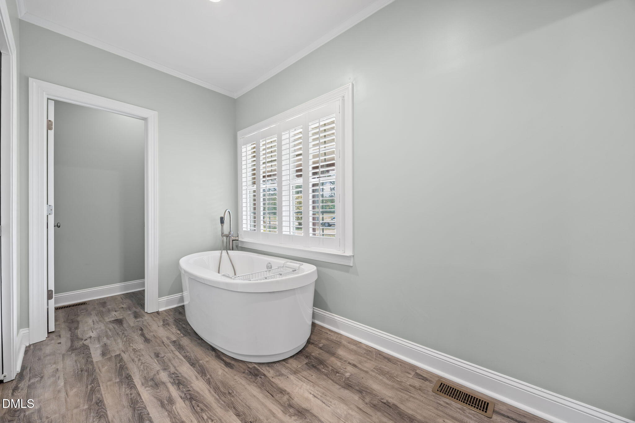 3611 Chewning Road Oxford, NC 27565 - Photo 39 of 45 a spacious bathroom with a sink and a mirror
