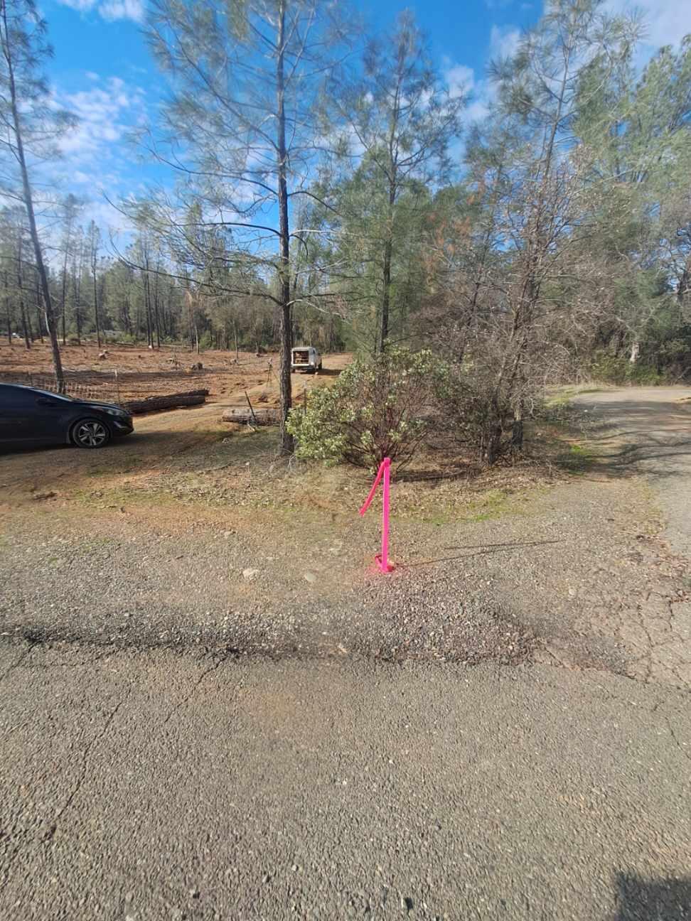 3082-3060 Keswick Dam Road Redding, CA 96003 - Photo 18 of 25 a front view of a house with a yard