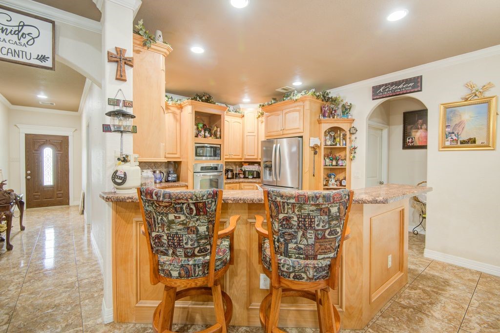 24910 Farm To Market 2004 Angleton, TX 77515 - Photo 11 of 50 a view of a dining room with furniture