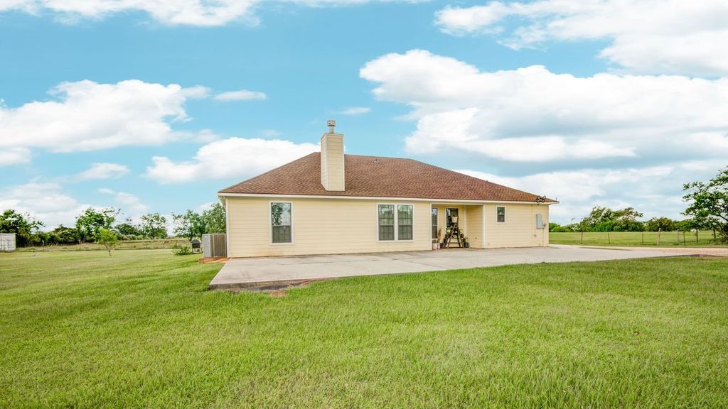 24910 Farm To Market 2004 Angleton, TX 77515 - Photo 41 of 50 a view of a house with a yard