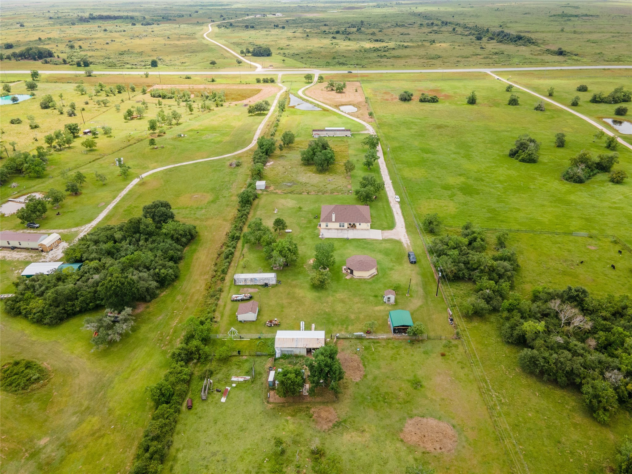 24910 Farm To Market 2004 Angleton, TX 77515 - Photo 47 of 50 a view of a yard with a swimming pool