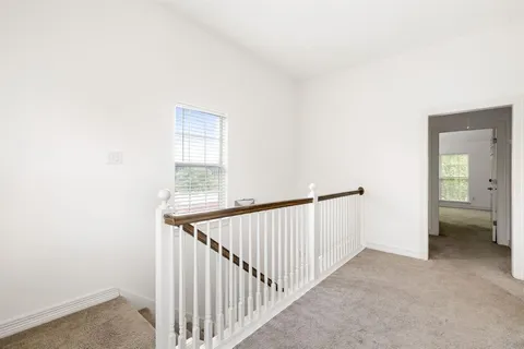 a view of a hallway with window