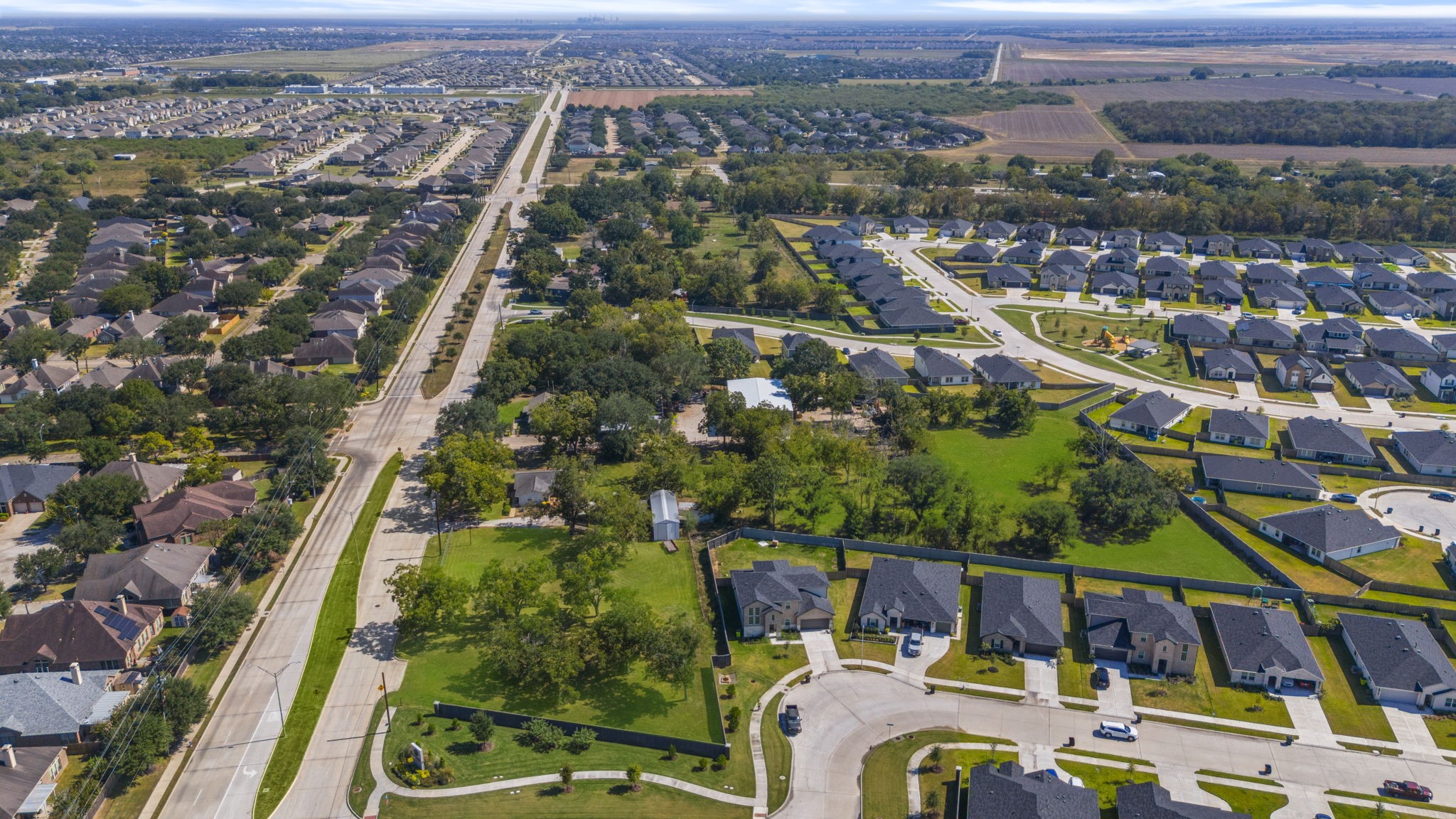 5418 Bryan Road Rosenberg, TX 77469 - Photo 11 of 49 an aerial view of residential houses with outdoor space