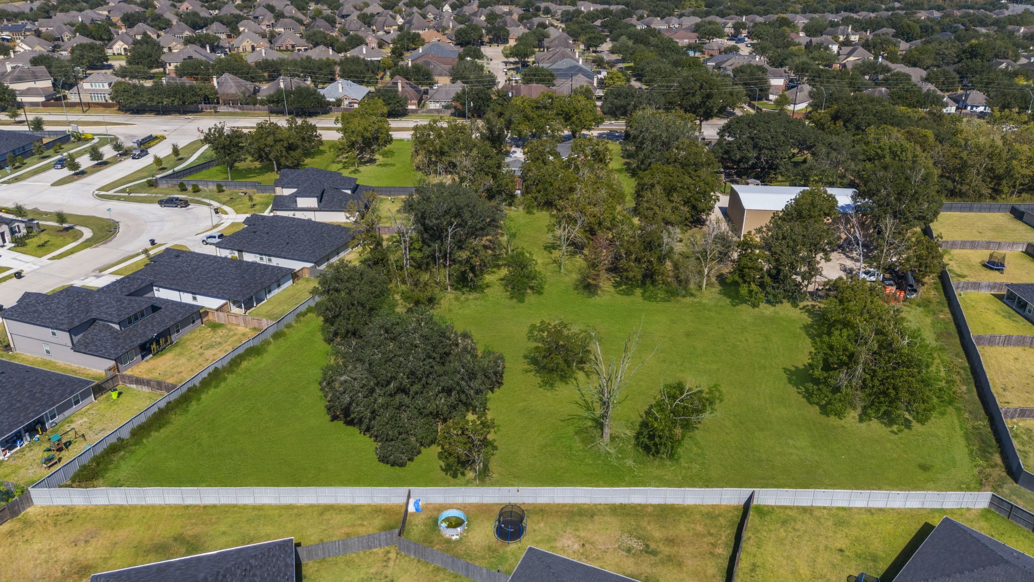 5418 Bryan Road Rosenberg, TX 77469 - Photo 13 of 49 an aerial view of a residential houses with outdoor space